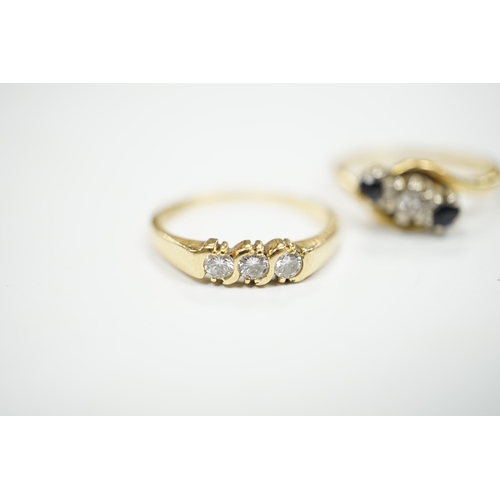 970 - An 18ct gold and three stone diamond ring, size M and an 18ct, sapphire and diamond set three stone ... 