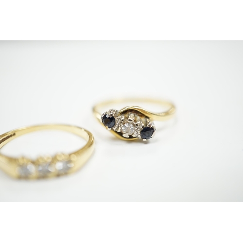 970 - An 18ct gold and three stone diamond ring, size M and an 18ct, sapphire and diamond set three stone ... 