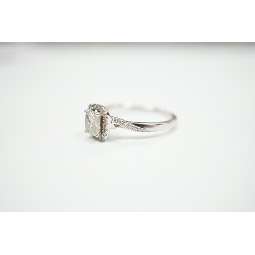 974 - A modern 14ct white gold and diamond set cluster ring, size M/N, gross weight 2.7 grams.