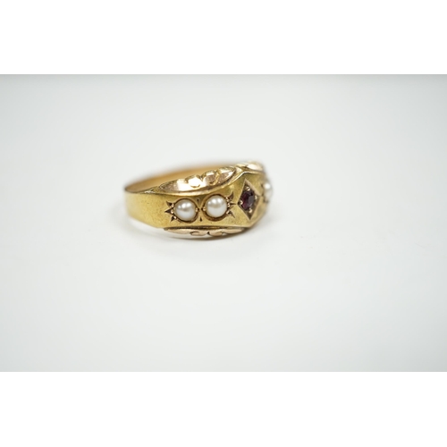 976 - A late Victorian 15ct gold, ruby and split pearl set half hoop ring, size M, gross weight 2.7 grams.... 