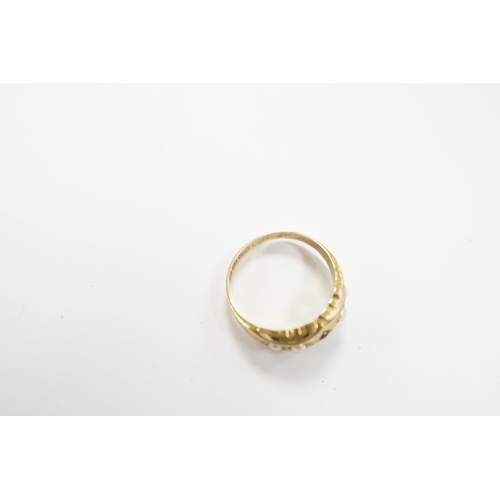 976 - A late Victorian 15ct gold, ruby and split pearl set half hoop ring, size M, gross weight 2.7 grams.... 