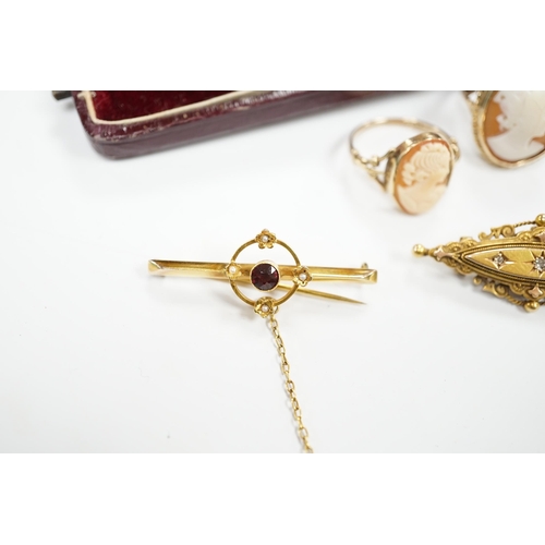 984 - A late Victorian 15ct gold and three stone diamond chip set brooch, 43mm, an early 20th century yell... 