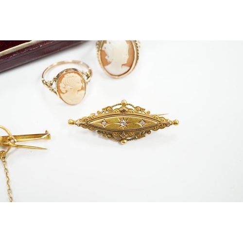 984 - A late Victorian 15ct gold and three stone diamond chip set brooch, 43mm, an early 20th century yell... 