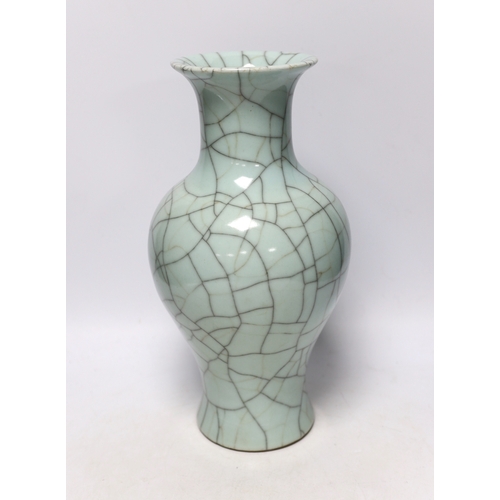 435 - A Chinese duck egg blue crackleware vase, 34.5cm high