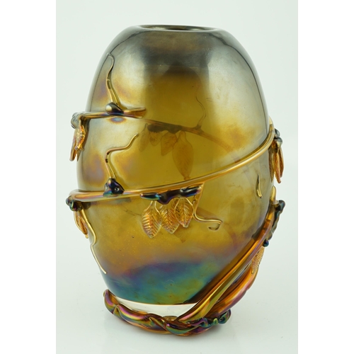 10 - ** ** A Murano amber glass ovoid shaped vase, entwined with leaves, signed, 37cm highPlease note thi... 