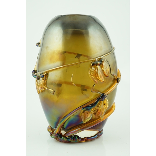 10 - ** ** A Murano amber glass ovoid shaped vase, entwined with leaves, signed, 37cm highPlease note thi... 