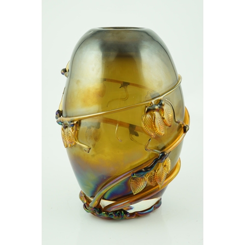 10 - ** ** A Murano amber glass ovoid shaped vase, entwined with leaves, signed, 37cm highPlease note thi... 