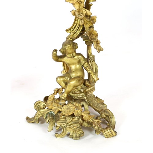 101 - A pair of late 19th century French Louis XVI style ormolu seven light candelabra, each with foliate ... 