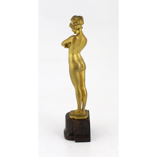 102 - Paul Philippe (French, 1870-1930), a gilt bronze figure of a standing nude woman, 'The Challenge', s... 