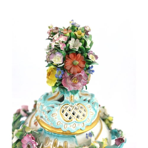 130 - A pair of Meissen topographical flower encrusted vases and covers, 19th century, each painted with t... 