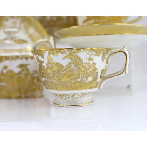 138 - An extensive Royal Crown Derby Gold Aves dinner and tea service, the majority for twelve place setti... 