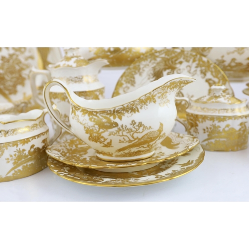 138 - An extensive Royal Crown Derby Gold Aves dinner and tea service, the majority for twelve place setti... 