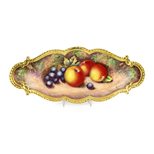 143 - A Royal Worcester fruit painted lozenge shaped dish, by R. Lewis, with gilt gadrooned scrolling bord... 