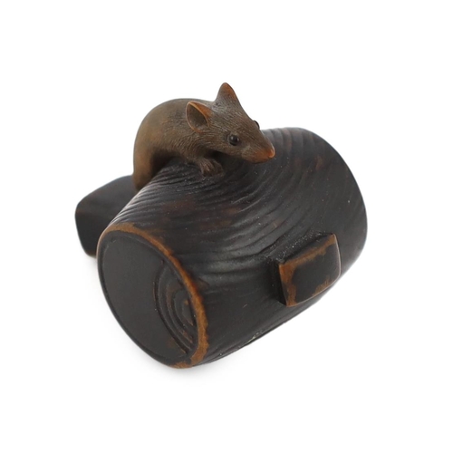 147 - * * A Japanese carved wood rat netsuke, early 19th century, formed as a rat, with inlaid eyes, resti... 