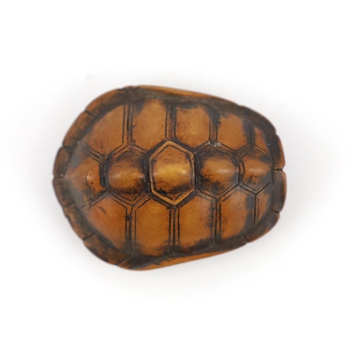 149 - * * A Japanese carved wood netsuke of a turtle shell, mid 19th century, the upper part of the himato... 