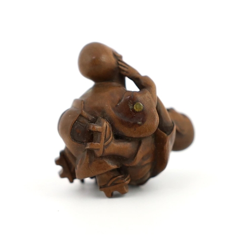 150 - * * A Tokyo School carved wood netsuke of two boys fighting, 19th century, signed Kakiman, one boy w... 