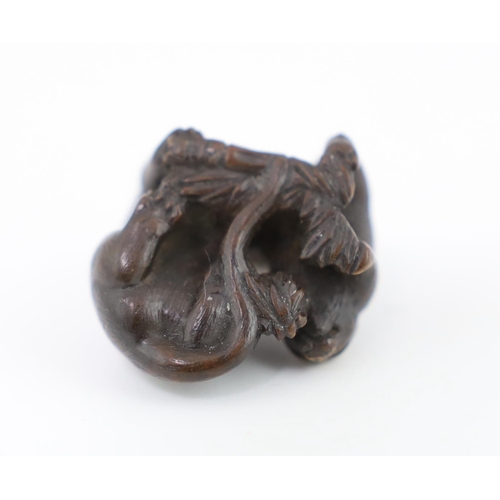 152 - * * A Japanese carved wood netsuke of a tiger and cub, 19th century, unsigned, 2.2cmProvenance: J. H... 