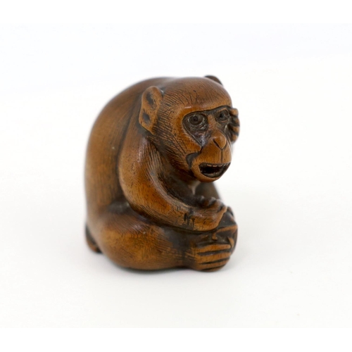 153 - * * A Japanese carved wood netsuke of an ape, Tamba School, 19th century, with inlaid eyes, 3.4cmPro... 