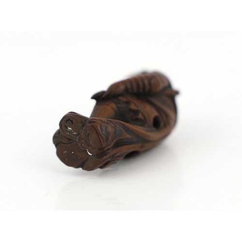 154 - * * A Japanese wood netsuke of Son Goku (Sun Wukong) flying on his cloud somersault, early 19th cent... 