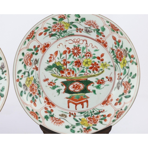 160 - A pair of Chinese famille verte dishes, Kangxi/Yongzheng period, each painted with a basket of flowe... 