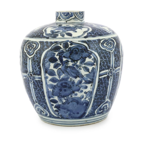 166 - A Chinese late Ming blue and white jar, Wanli period, typically painted with flower and rockwork in ... 