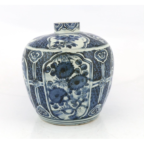 166 - A Chinese late Ming blue and white jar, Wanli period, typically painted with flower and rockwork in ... 