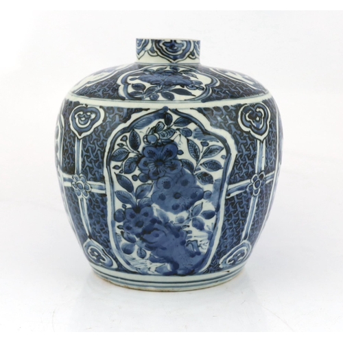 166 - A Chinese late Ming blue and white jar, Wanli period, typically painted with flower and rockwork in ... 