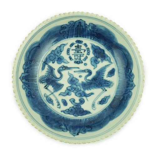 168 - A Chinese blue and white phoenix saucer dish, Jiajing mark and probably of the period, the centre ... 