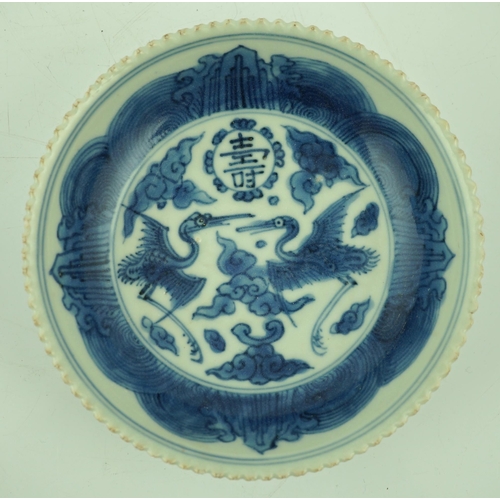 168 - A Chinese blue and white phoenix saucer dish, Jiajing mark and probably of the period, the centre ... 