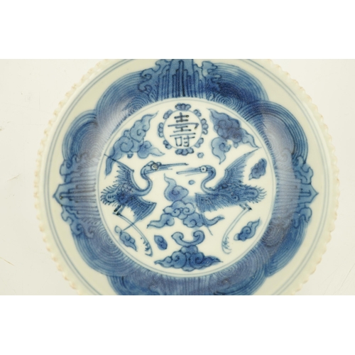 168 - A Chinese blue and white phoenix saucer dish, Jiajing mark and probably of the period, the centre ... 