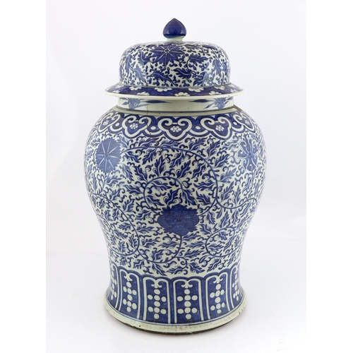 177 - A massive Chinese blue and white lotus vase and cover, 18th/19th century, the shoulder with repeat... 