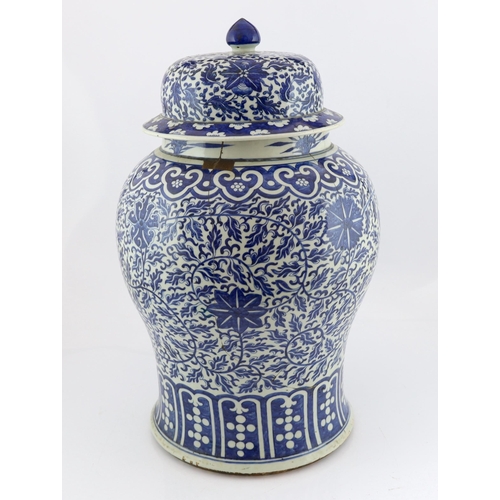 177 - A massive Chinese blue and white lotus vase and cover, 18th/19th century, the shoulder with repeat... 