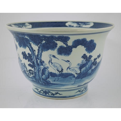 182 - A Chinese blue and white 'deer and cranes' planter, 19th century, painted with deer, cranes, pine tr... 