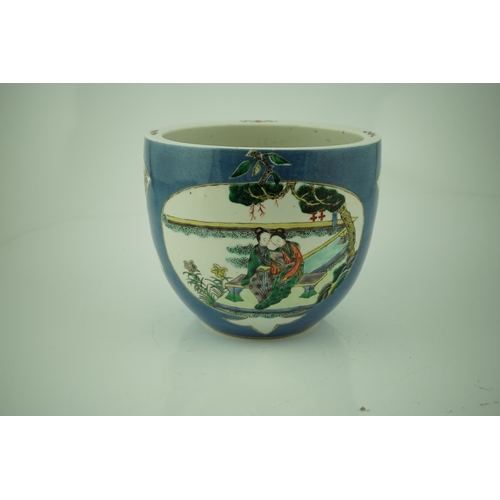 183 - A Chinese powder blue small jardiniere, 19th century, painted in famille verte palette with two ladi... 