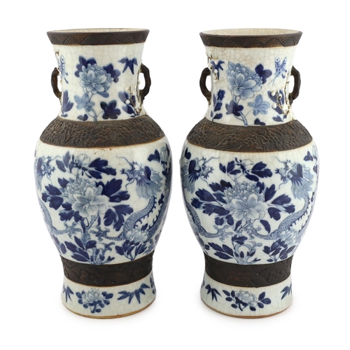 188 - A pair of large Chinese blue and white crackle-glaze dragon vases, early 20th century, each painte... 