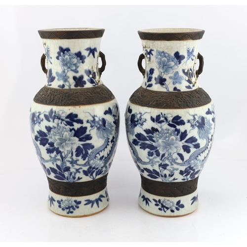 188 - A pair of large Chinese blue and white crackle-glaze dragon vases, early 20th century, each painte... 