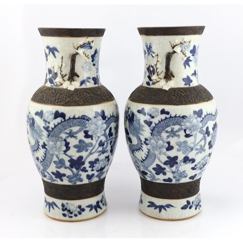 188 - A pair of large Chinese blue and white crackle-glaze dragon vases, early 20th century, each painte... 