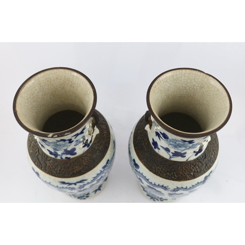 188 - A pair of large Chinese blue and white crackle-glaze dragon vases, early 20th century, each painte... 