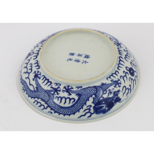 189 - A Chinese blue and white dragon dish, Guangxu mark and of the period (1875-1908), finely painted t... 