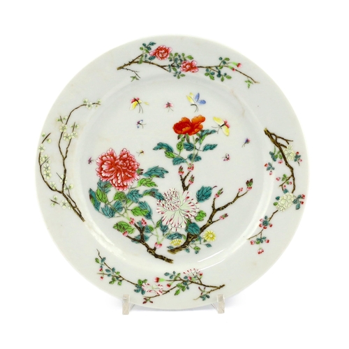 193 - A Chinese famille rose 'peony' plate, Guangxu mark and of the period (1875-1908), finely painted wit... 