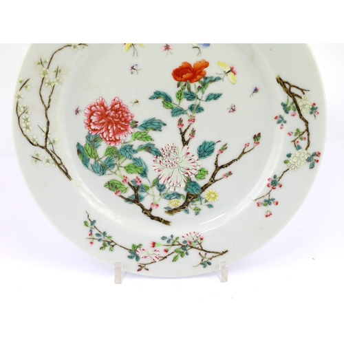 193 - A Chinese famille rose 'peony' plate, Guangxu mark and of the period (1875-1908), finely painted wit... 