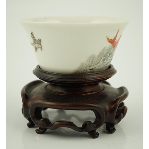 196 - A Chinese enamelled porcelain 'leaping carp' cup, Daoguang mark and possibly of the period, painted ... 