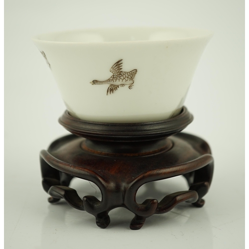 196 - A Chinese enamelled porcelain 'leaping carp' cup, Daoguang mark and possibly of the period, painted ... 