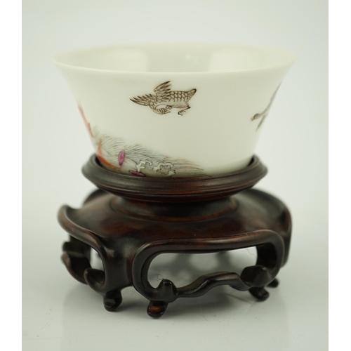 196 - A Chinese enamelled porcelain 'leaping carp' cup, Daoguang mark and possibly of the period, painted ... 