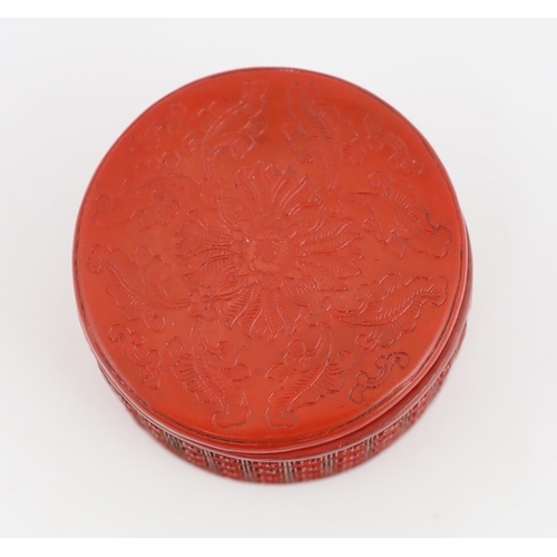 202 - * * A Chinese cinnabar lacquer circular box, Qianlong period, the lid carved with a scholar and boy ... 