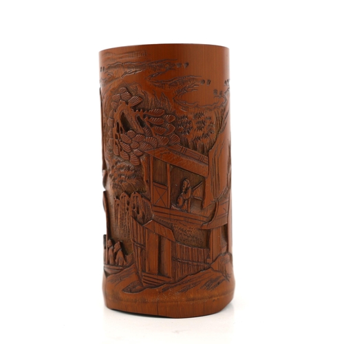 210 - A Chinese bamboo 'river landscape' inscribed brushpot, bitong, 19th century, carved in relief with f... 