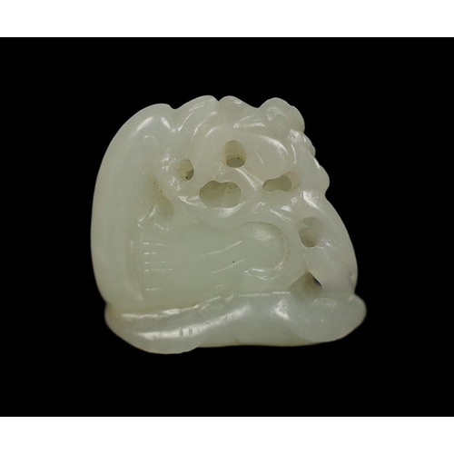 212 - * * A Chinese small white jade carving of a stylised duck, late Qing dynasty, clasping a sprig of lo... 