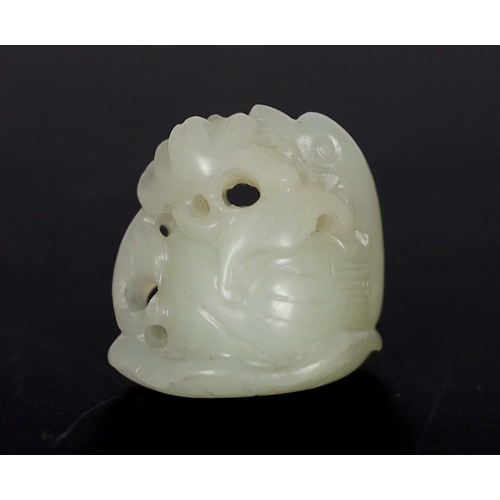 212 - * * A Chinese small white jade carving of a stylised duck, late Qing dynasty, clasping a sprig of lo... 