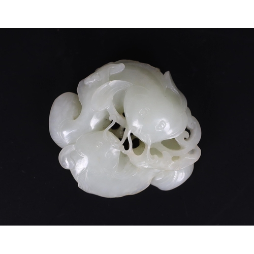 214 - * * A Chinese white jade group of two catfish, 18th century, each fish biting a sprig of lingzhi fun... 