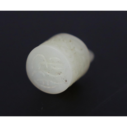 217 - * * A Chinese miniature white jade seal of archaic bronze bell form, late Qing dynasty, carved in lo... 